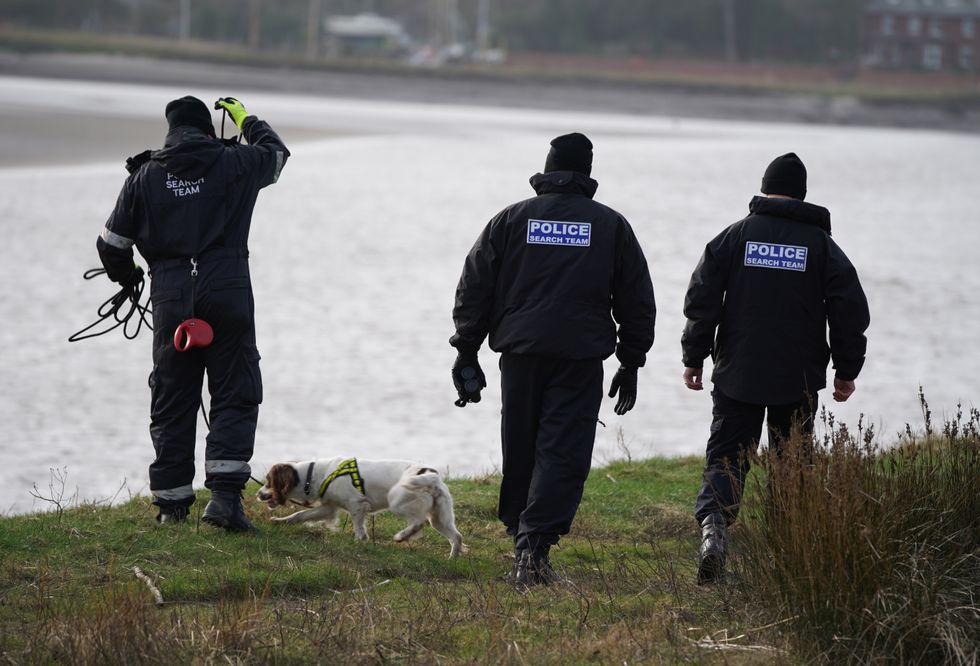 Police search teams on the banks of the River Wyre in Hambleton, Lancashire, as police continue their search for missing woman Nicola Bulley, 45, who vanished on January 27 while walking her springer spaniel Willow shortly after dropping her daughters, aged six and nine, at school. Picture date: Friday February 17, 2023.