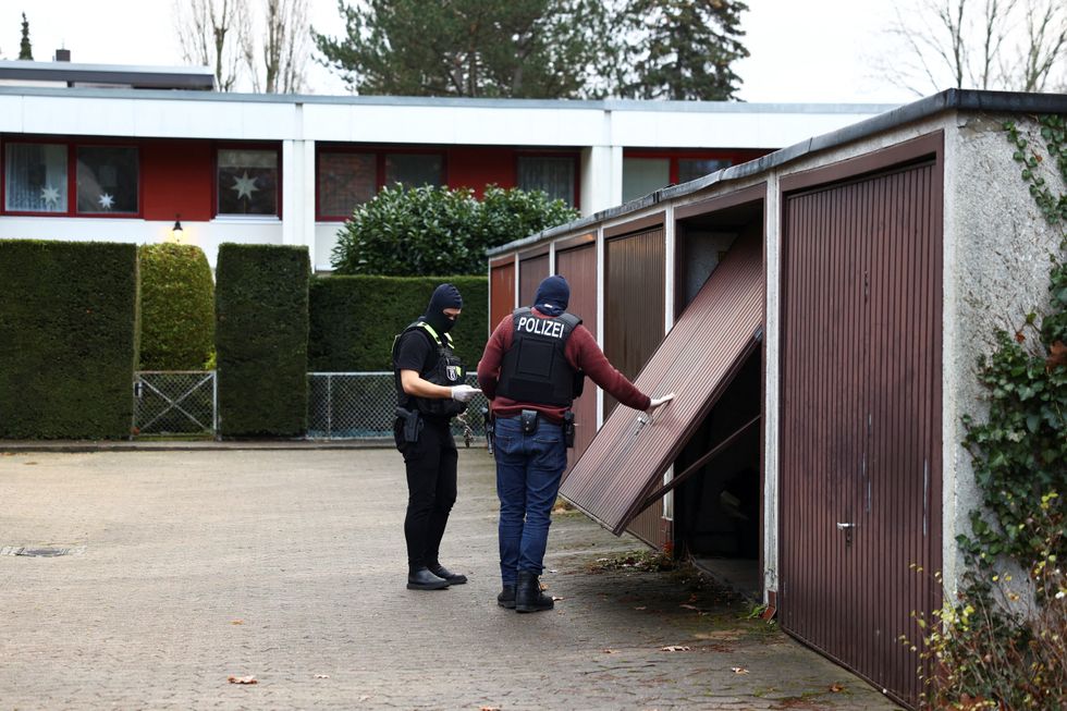 Police secures the area after 25 suspected members and supporters of a far-right group were detained during raids across Germany, in Berlin, Germany December 7, 2022.   REUTERS/Christian Mang
