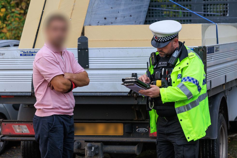 Police stopping driver for drink driving