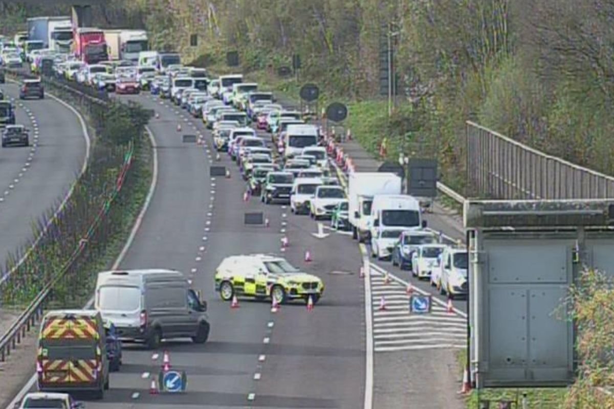 Police stopping traffic on the M23