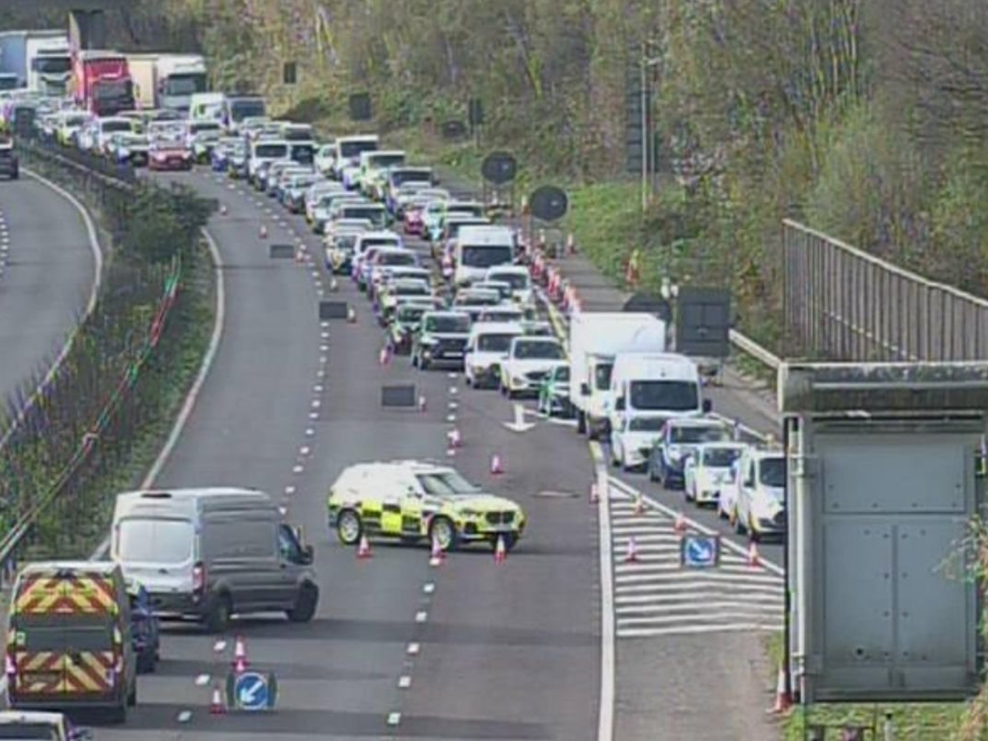 Police stopping traffic on the M23