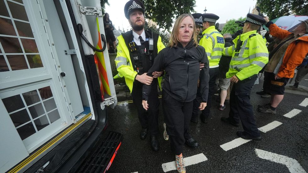 Police taking away a protester in London yesterday\u200b