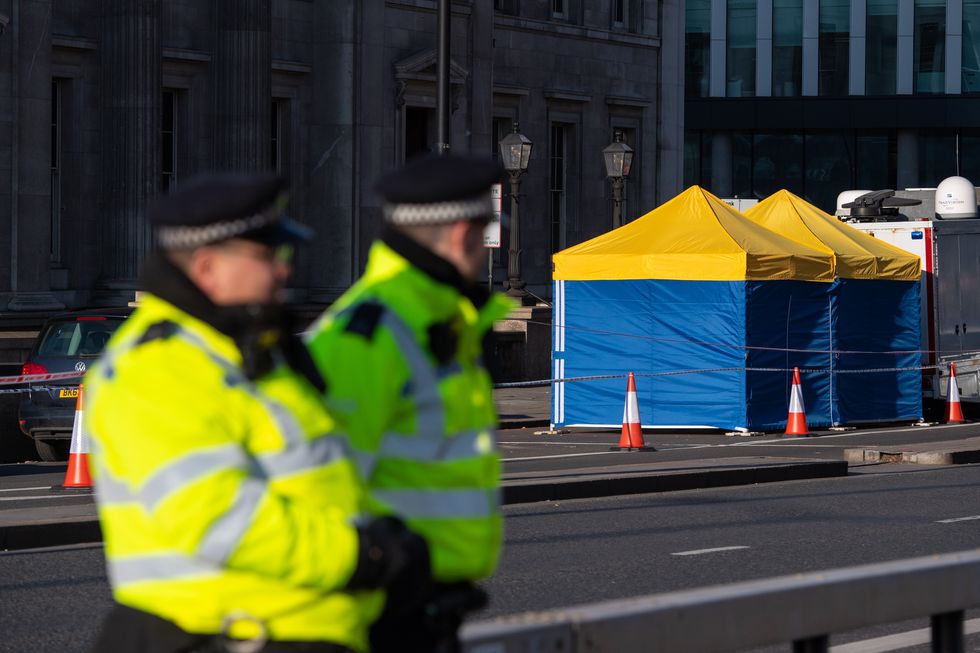 Police tents outside Fishmonger's Hall, on London Bridge, following the London Bridge terrorist attack