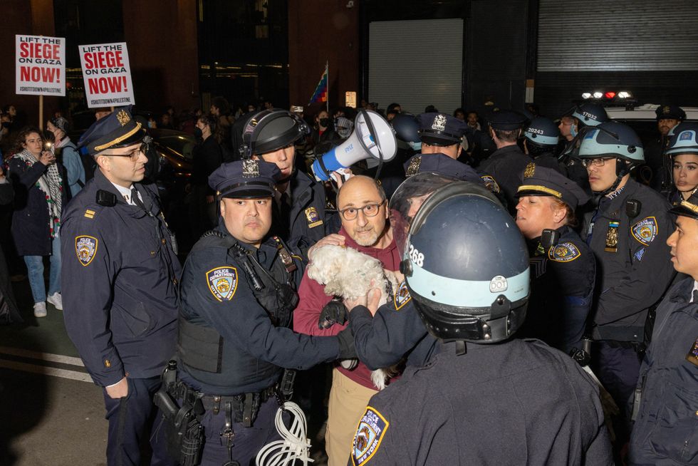 Police try to calm protests