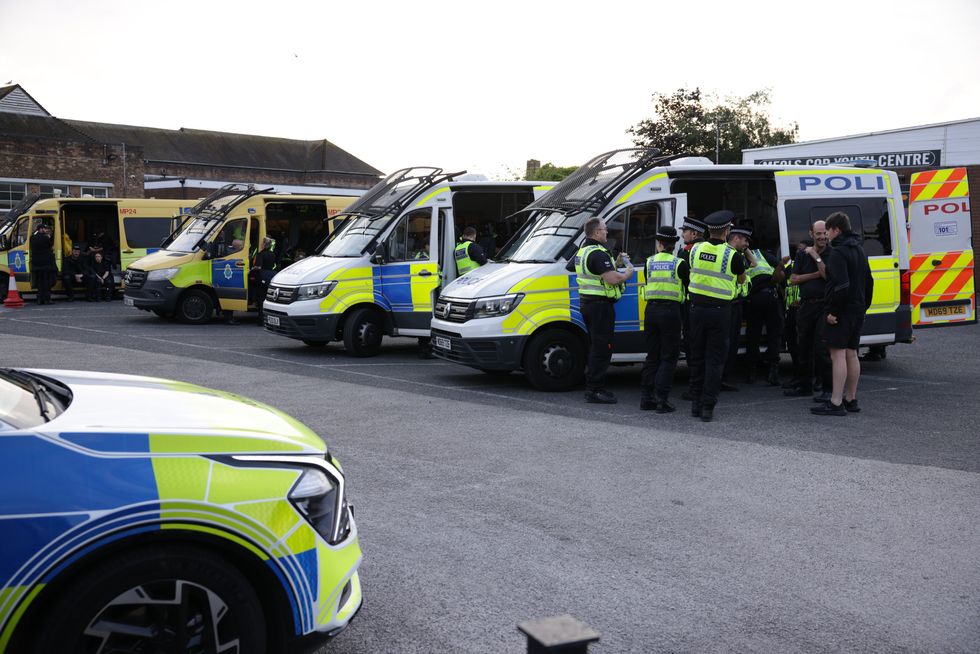 Police vans in Southport