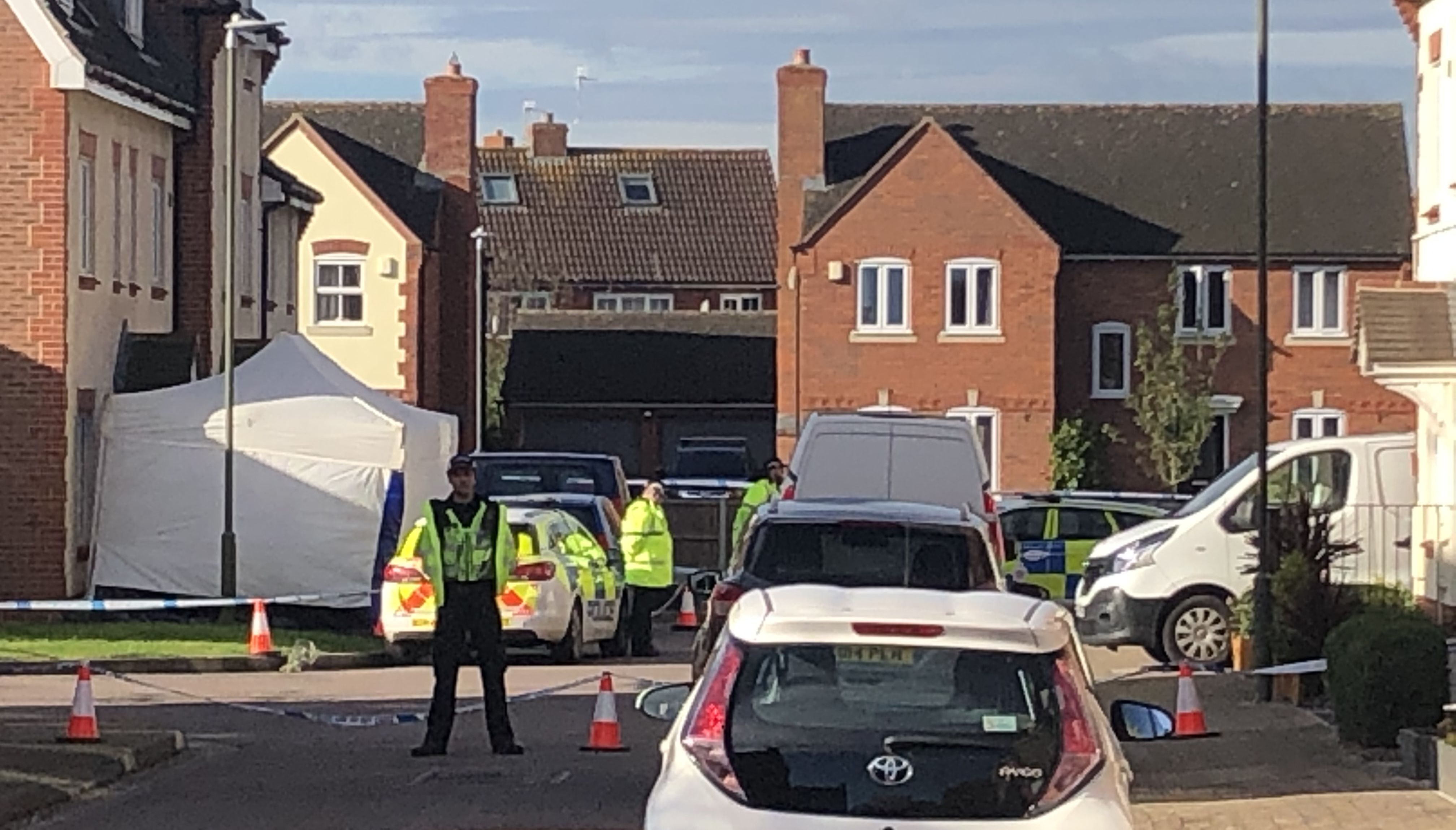 Policed activity at Snowdonia Road, Walton Cardiff, Tewkesbury, after one man died and another suffered serious injuries during a series of stabbings.