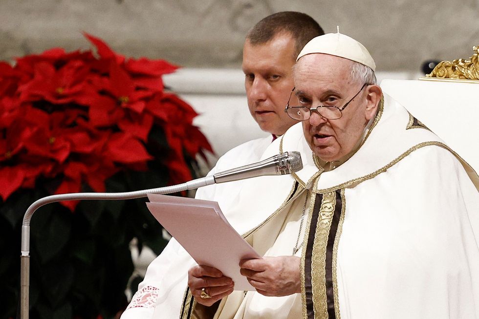Pope Francis celebrates Christmas Eve mass in St. Peter's Basilica at the Vatican, December 24, 2022. REUTERS/Guglielmo Mangiapane