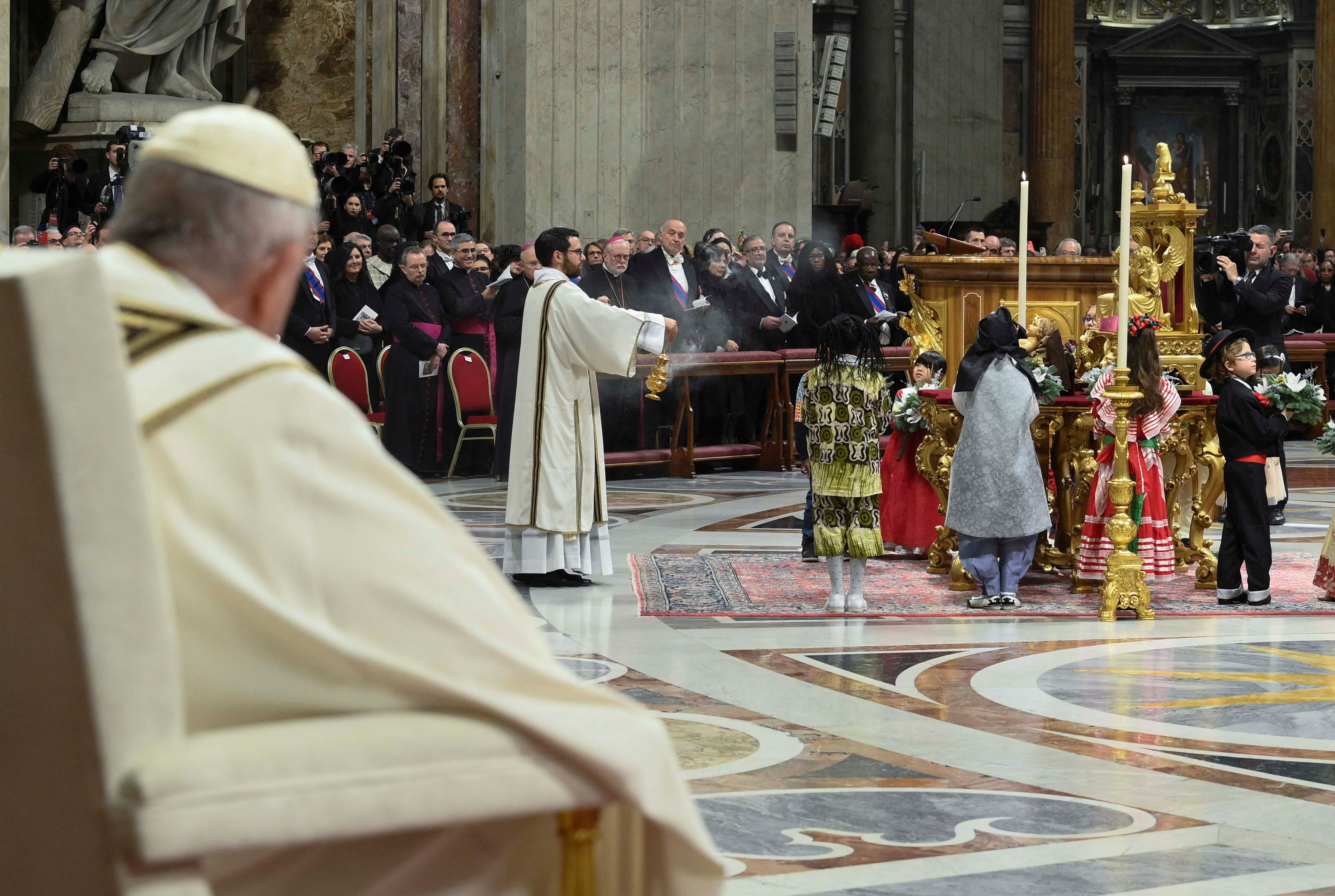 Pope Francis celebrates Christmas Eve mass in St. Peter's Basilica at the Vatican, December 24, 2022. Vatican Media/\u00adHandout via REUTERS ATTENTION EDITORS - THIS IMAGE WAS PROVIDED BY A THIRD PARTY.