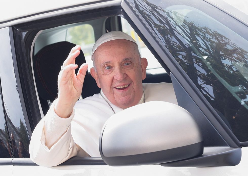 Pope Francis waving