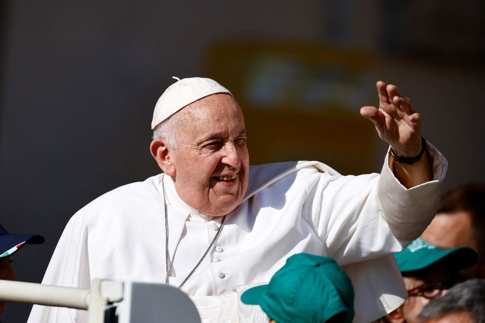 Pope Francis waving