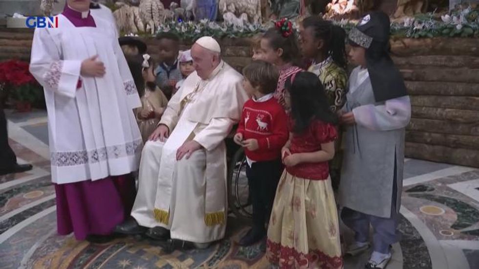 Pope health fears: Francis arrives in wheelchair for Christmas mass at Vatican and is unable to stand to deliver sermon - 'In a lot of pain'