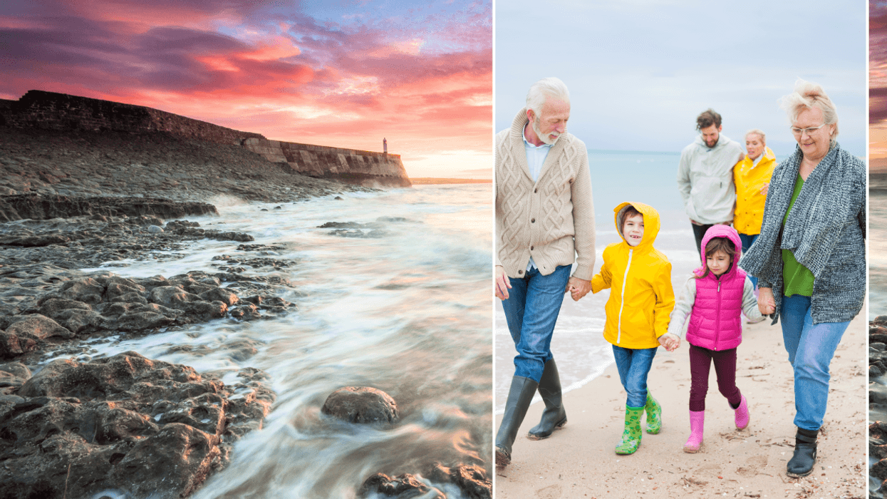 Porthcawl South Wales coast / family walking on beach