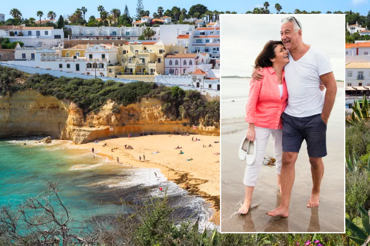Portugal beach / retired couple walking on beach