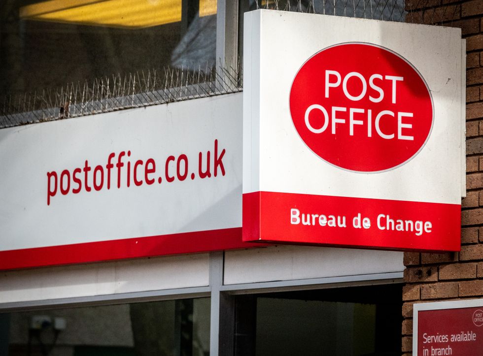 Post Office sign in pictures