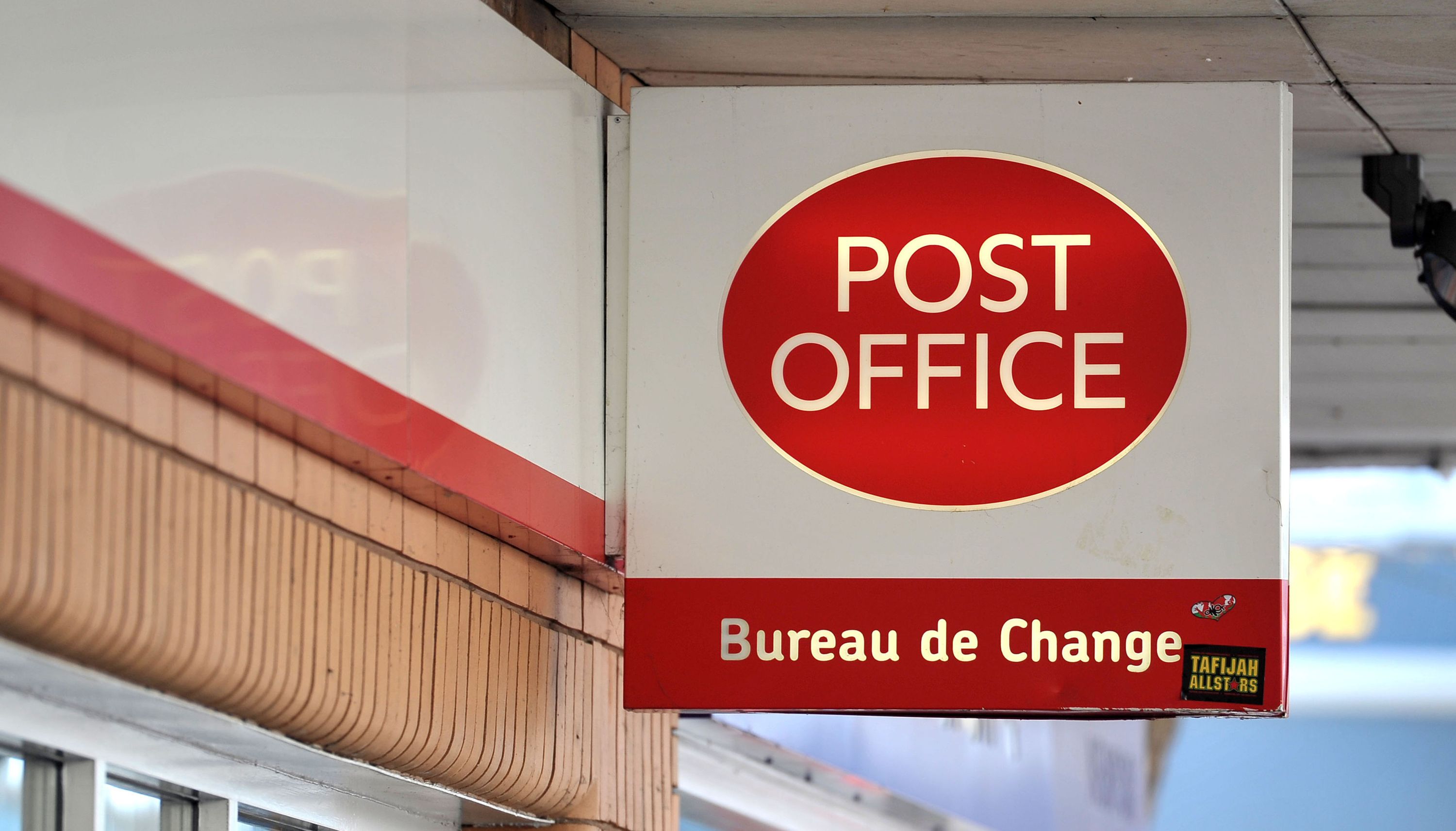 Post Office workers go on strike in dispute over pay