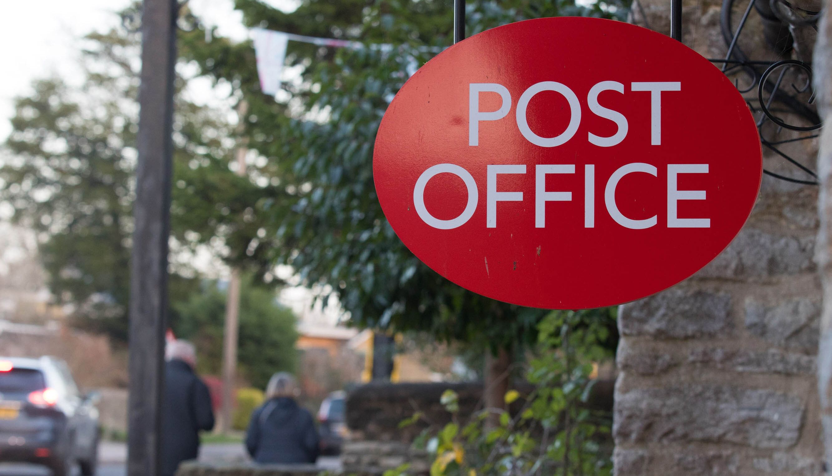 Post Office workers go on strike in dispute over pay