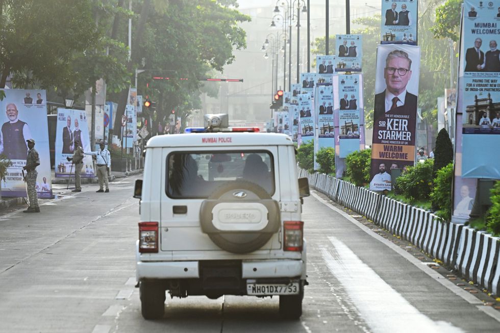 Posters of Sir Keir Starmer line the streets of Mumbai ahead of his visit today