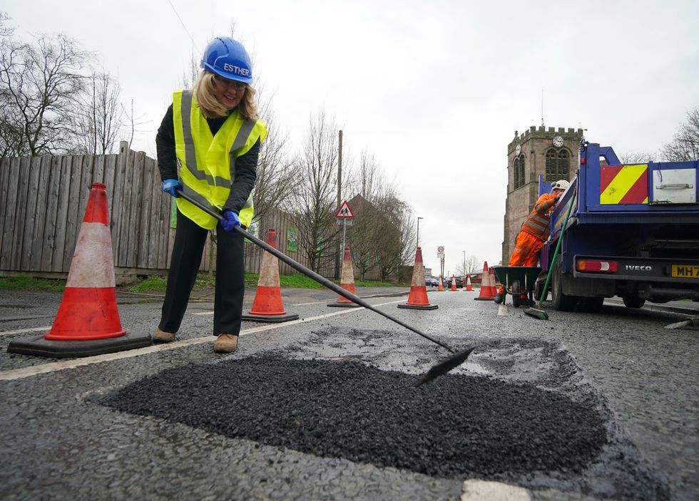Pothole getting cleared