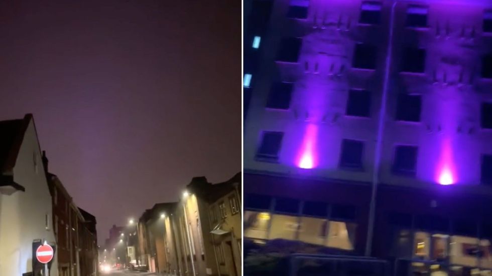 Premier Inn lit up in purple