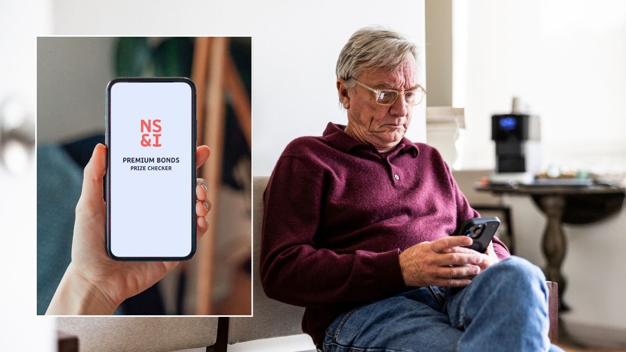 Premium Bonds prize checker and man looking at phone