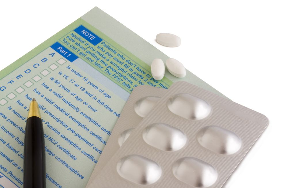 Prescription note and packets of tablets