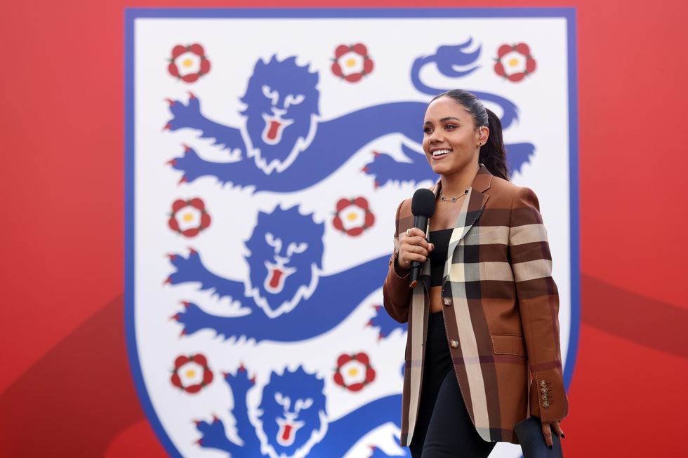 Presenter Alex Scott on stage during a fan celebration to commemorate England's historic UEFA Women's EURO 2022 triumph in Trafalgar Square, London. Picture date: Monday August 1, 2022.