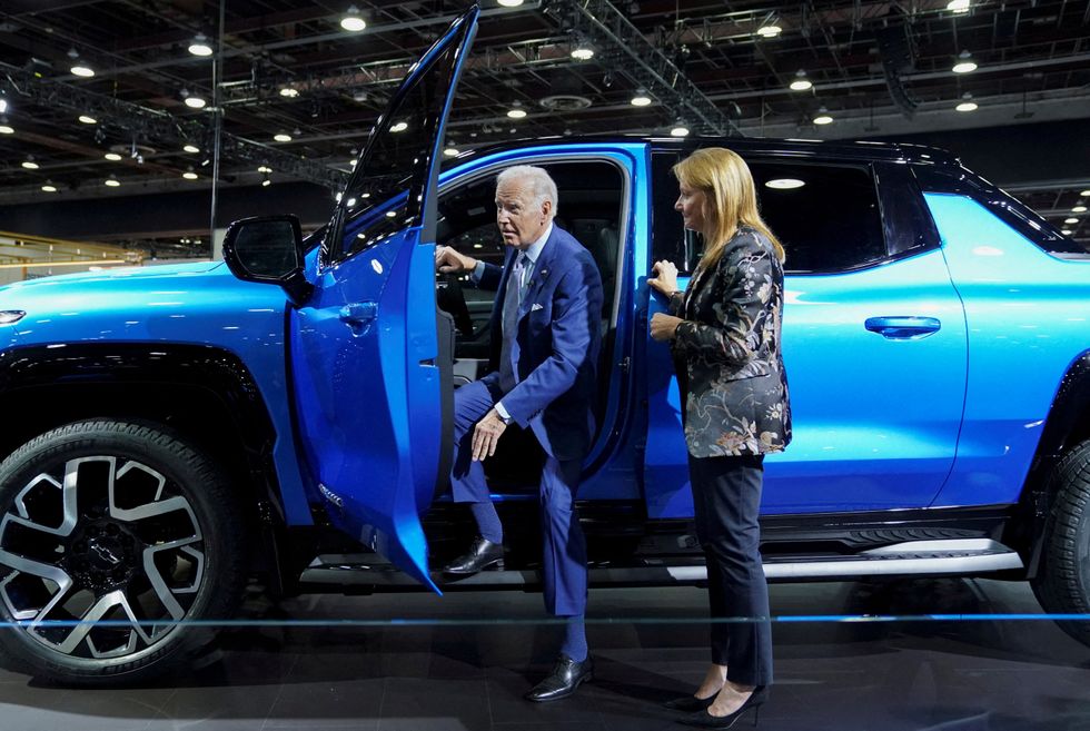 President Biden with an electric Chevrolet Silverado EV pickup truck
