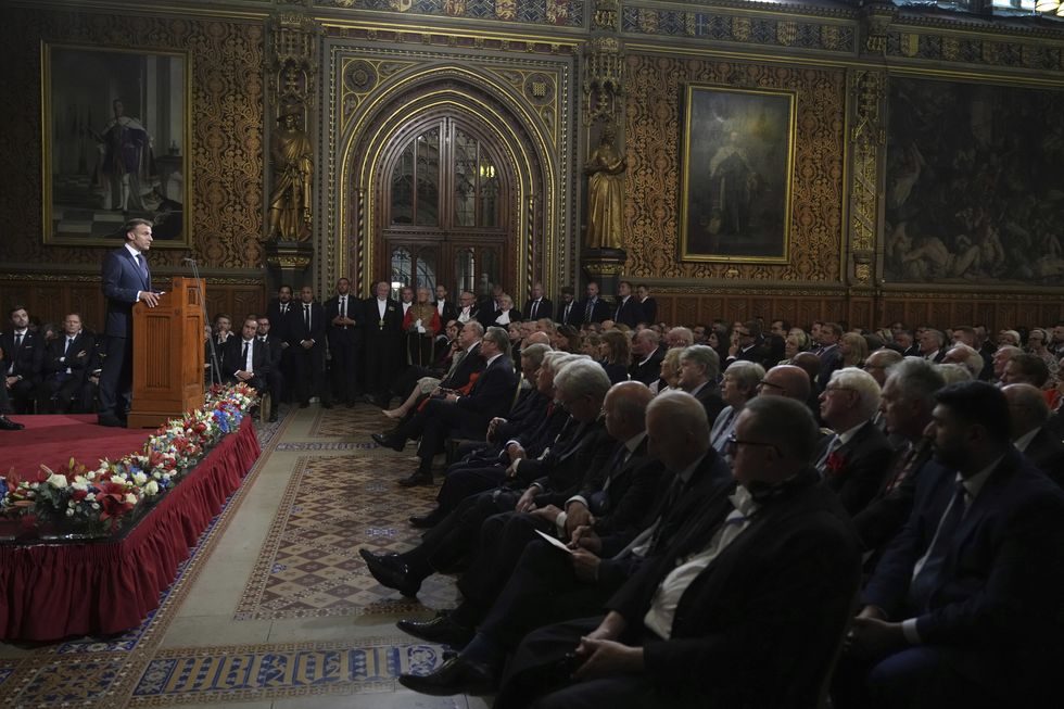 President of France Emmanuel Macron addresses MPs and peers in the Royal Gallery at the Palace of Westminster