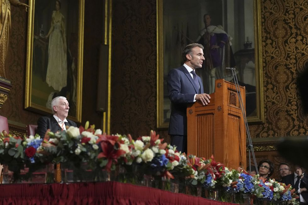 President of France Emmanuel Macron addresses MPs and peers in the Royal Gallery at the Palace of Westminster