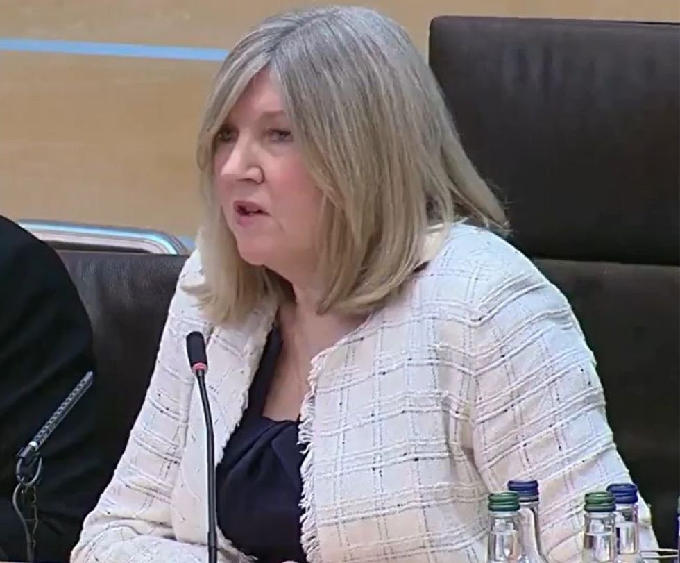 Presiding Officer Alison Johnstone announced that a fire had been reported in the building