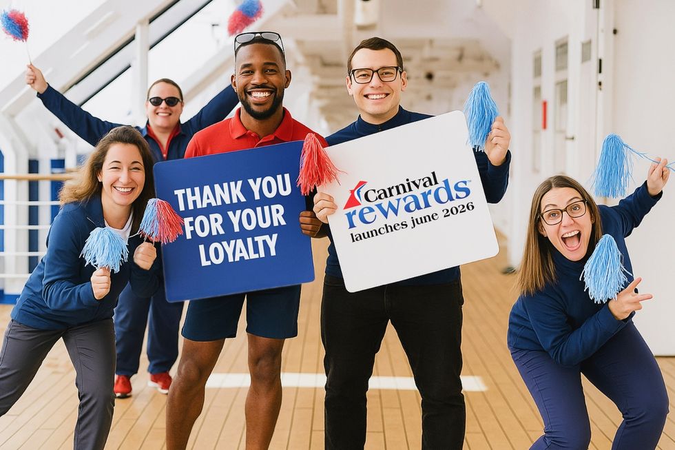 Press image of people on Carnival ship holding rewards banner