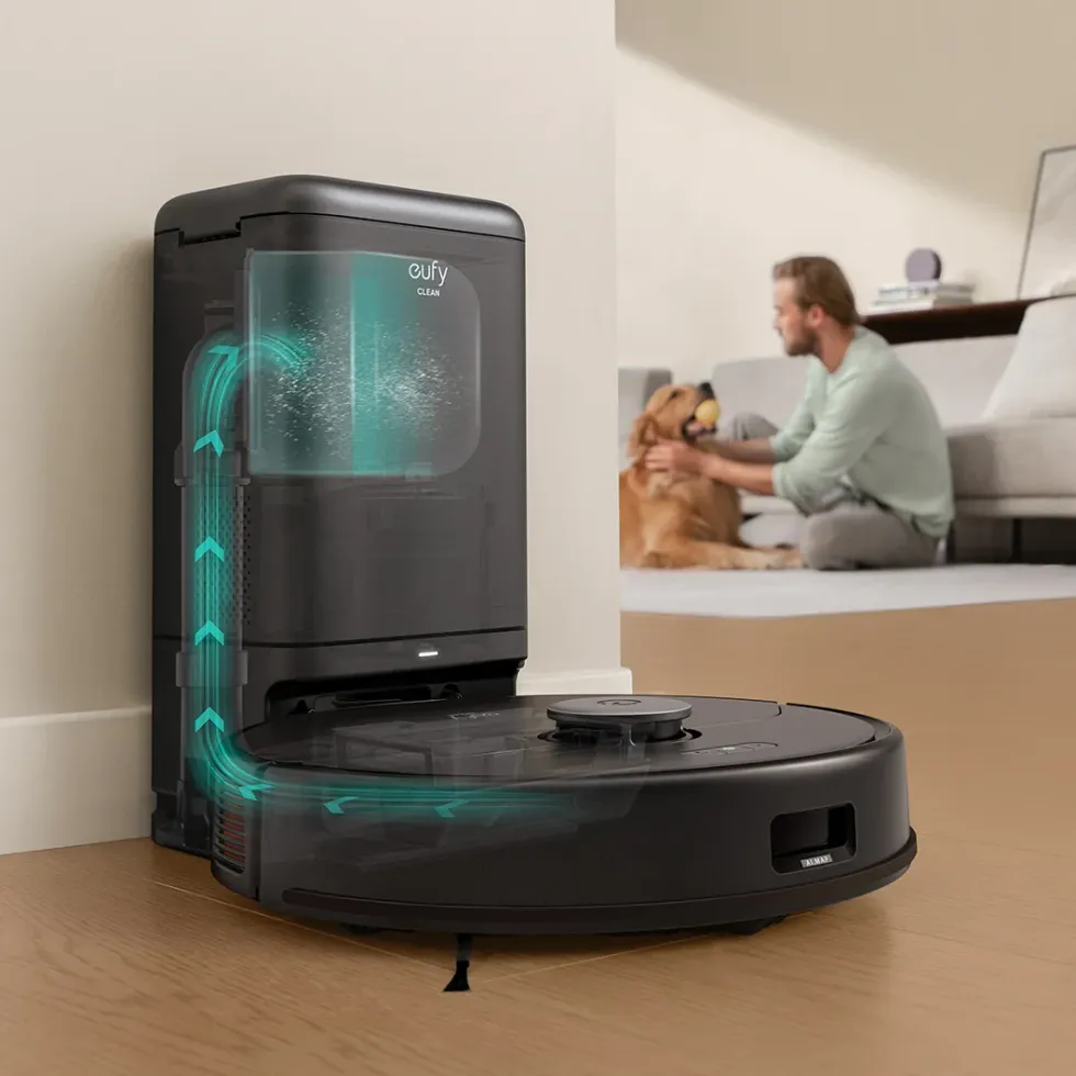 press image showing the eufy robot vacuum emptying its dust into the charging station