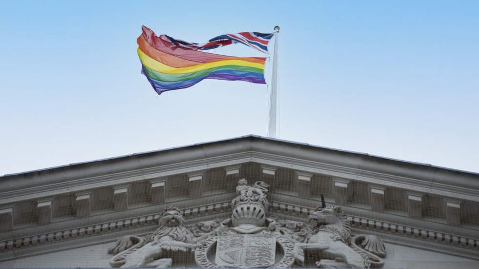 Pride flag flying from the Treasury