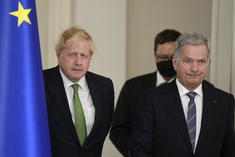 Prime Minister Boris Johnson and Finland's President Sauli Niinisto, at a press conference at the Presidential Palace in Helsinki