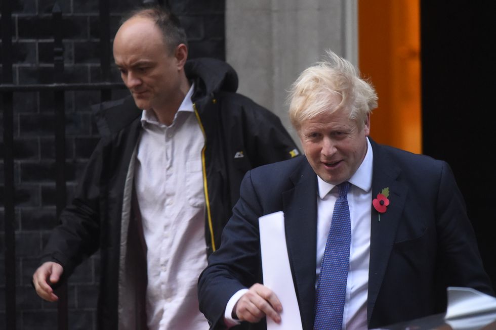 Prime Minister Boris Johnson and his political advisor Dominic Cummings leave 10 Downing Street on October 28, 2019 in London