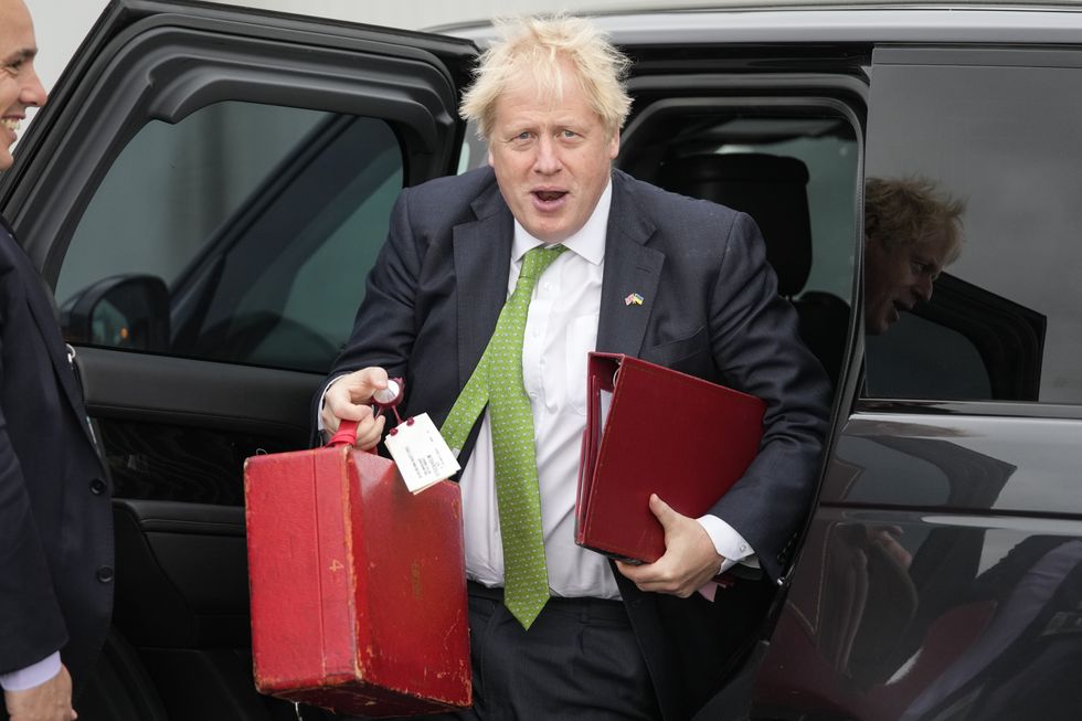 Prime Minister Boris Johnson arrives at London Stansted.