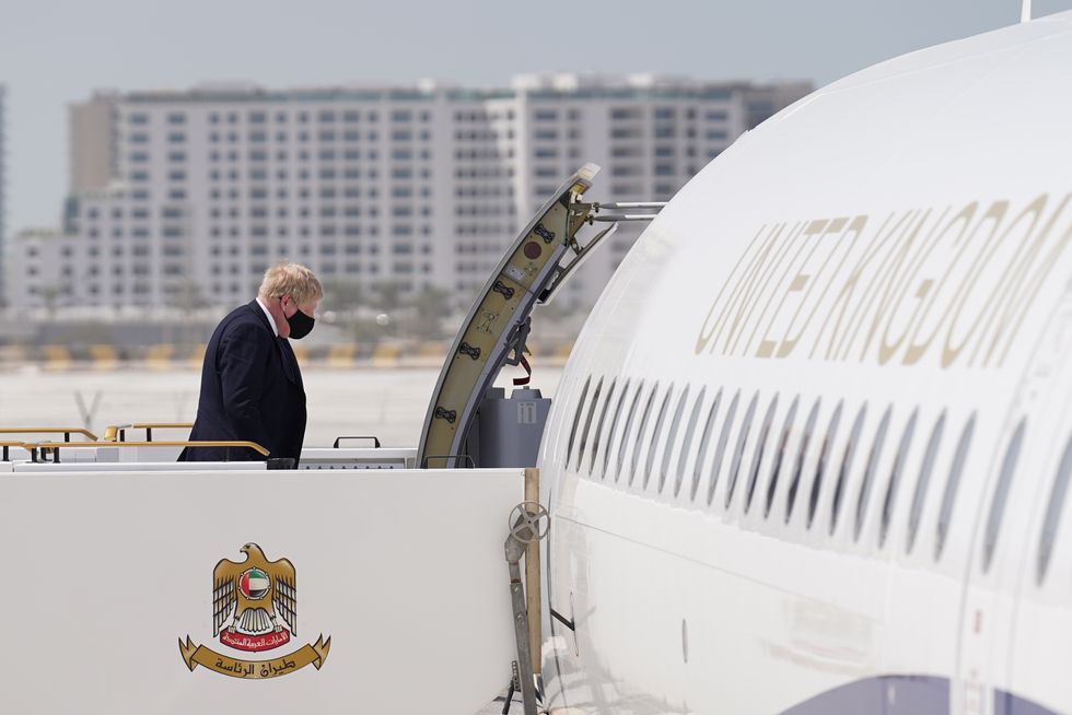 Prime Minister Boris Johnson boards his plane at Abu Dhabi airport. Picture date: Wednesday March 16, 2022.