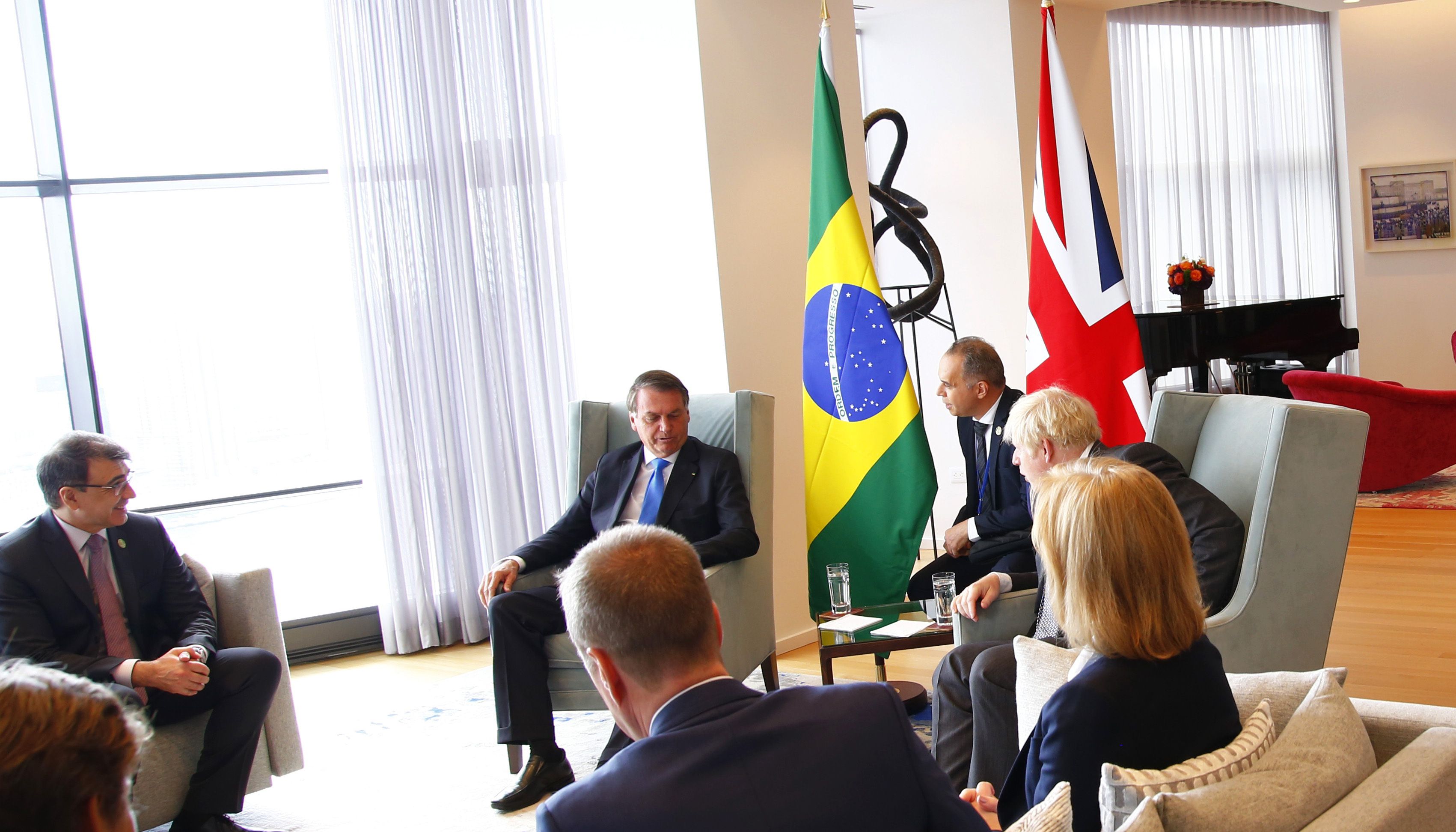 Prime Minister Boris Johnson (centre) with Brazil's president Jair Bolsonaro (second left) during a bilateral meeting at the UK diplomatic residence in New York.