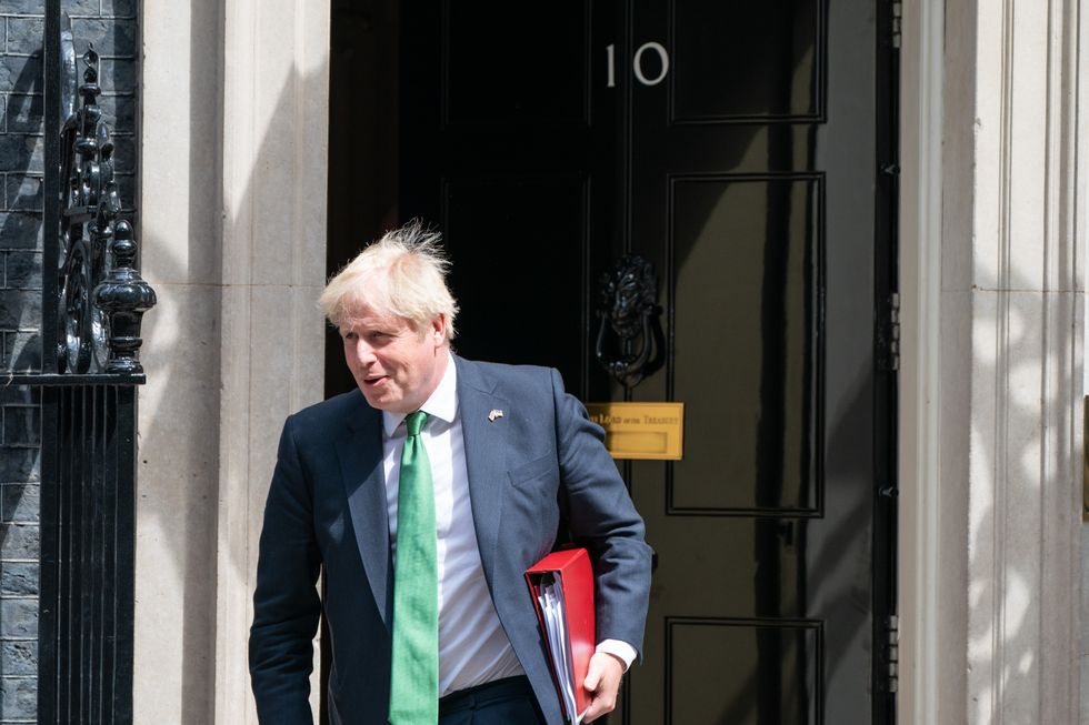 Prime Minister Boris Johnson departs 10 Downing Street, Westminster, London, to attend his penultimate Prime Minister's Questions at the Houses of Parliament. Picture date: Wednesday July 13, 2022.