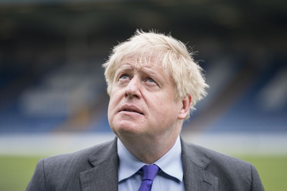 Prime Minister Boris Johnson during a visit to Bury FC at their ground in Gigg Lane, Bury, Greater Manchester.