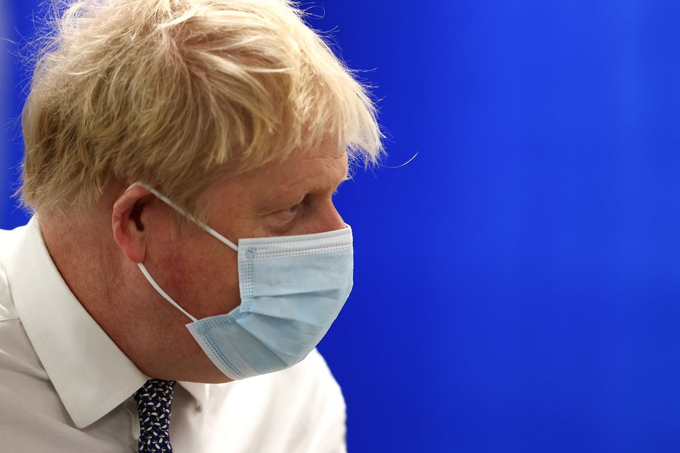 Prime Minister Boris Johnson during a visit to Milton Keynes University Hospital in Buckinghamshire.