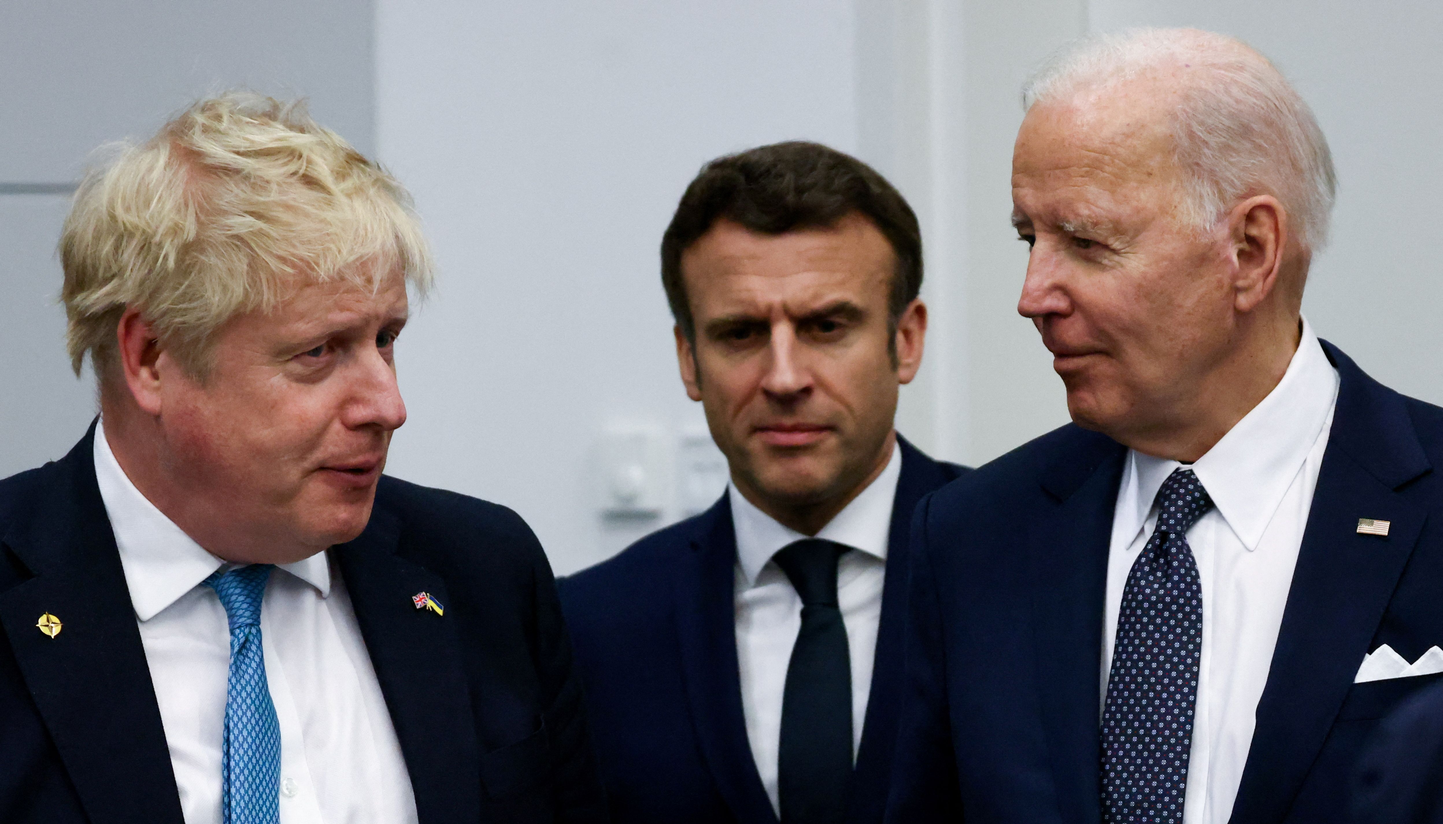 Prime Minister Boris Johnson, France's President Emmanuel Macron and U.S. President Joe Biden at a G7 leaders meeting during a NATO summit on Russia's invasion of Ukraine, at the alliance's headquarters in Brussels.