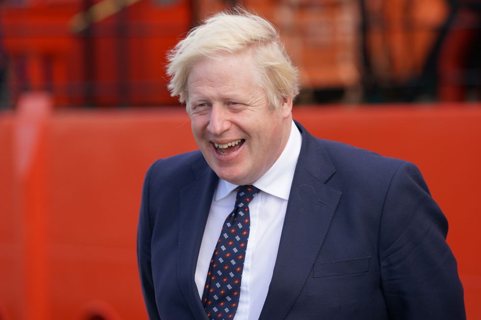 Prime Minister Boris Johnson in Fraserburgh Harbour, Aberdeenshire, as he journeys to the Moray Offshore Windfarm East during his visit to Scotland. Picture date: Thursday August 5, 2021.