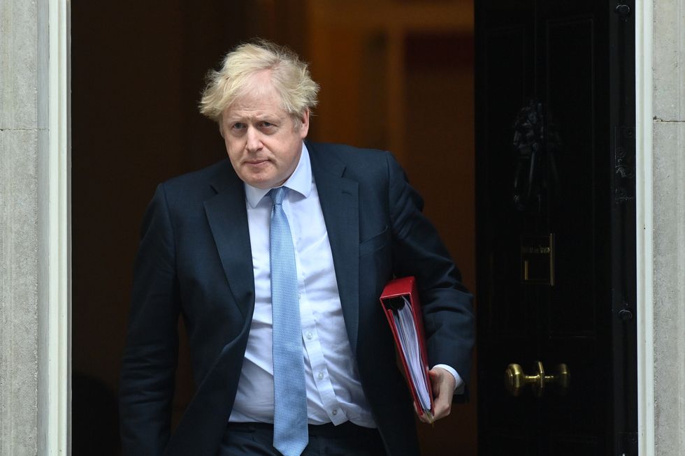 Prime Minister Boris Johnson leaves 10 Downing Street, London, to attend Prime Minister's Questions at the Houses of Parliament. Picture date: Wednesday February 9, 2022.