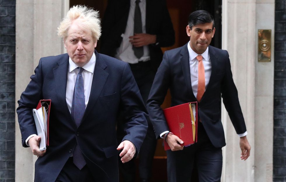 Prime Minister Boris Johnson (left) and Chancellor of the Exchequer Rishi Sunak leave 10 Downing Street London, ahead of a Cabinet meeting at the Foreign and Commonwealth Office.