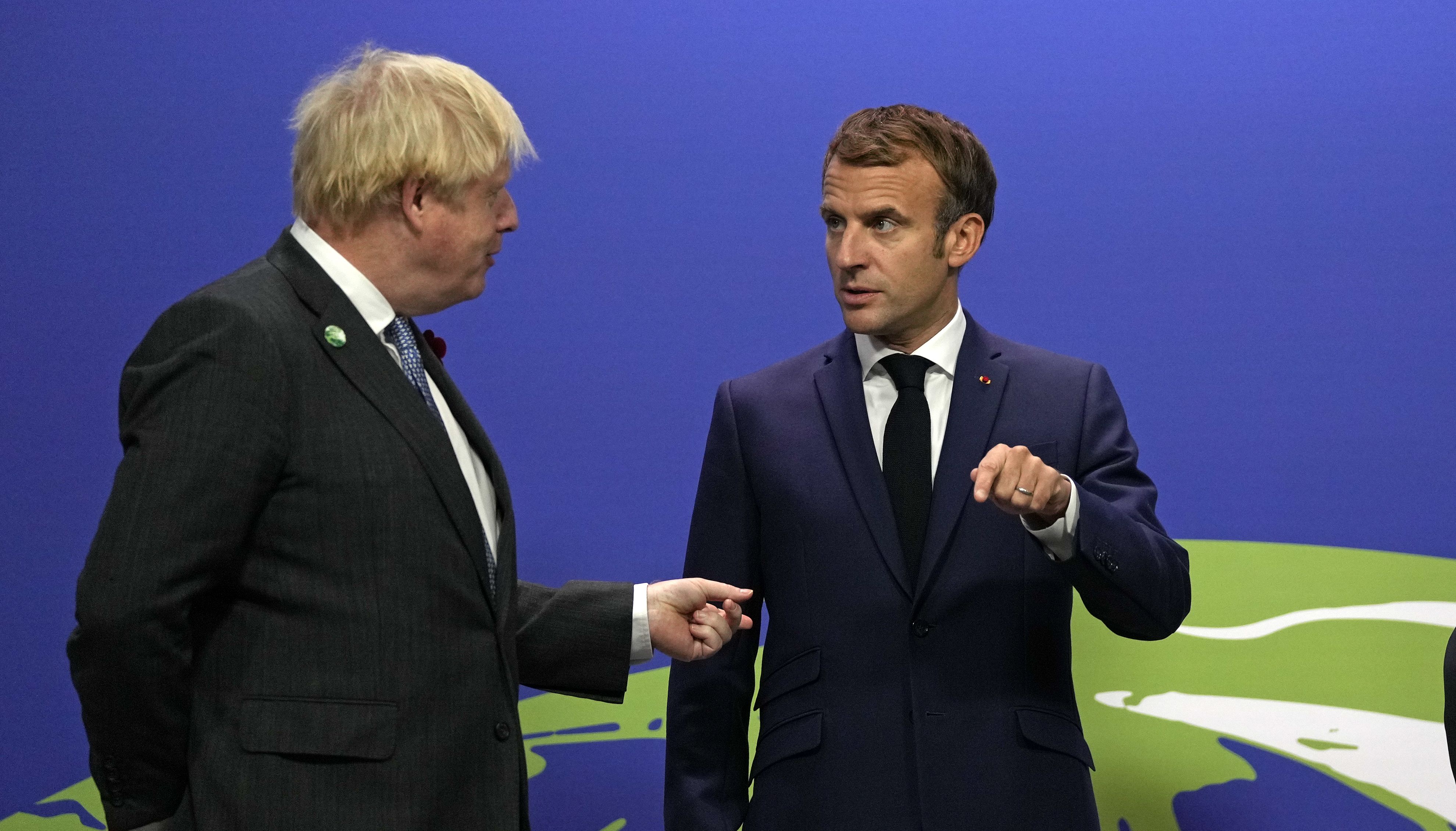 Prime Minister Boris Johnson (left) greets French President Emmanuel Macron at the Cop26 summit at the Scottish Event Campus (SEC) in Glasgow.