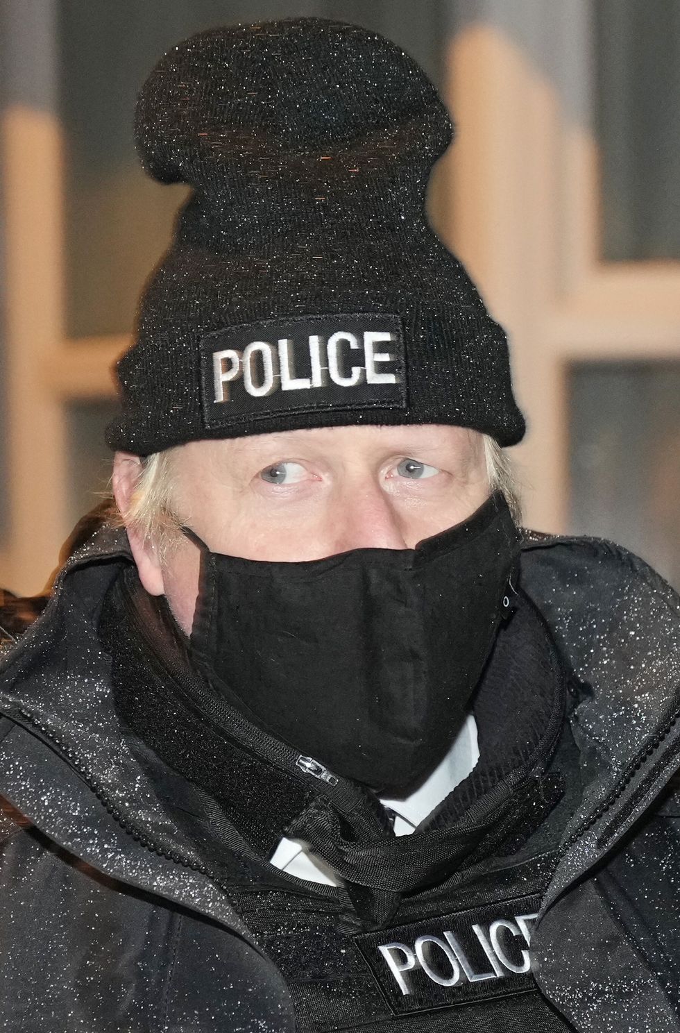 Prime Minister Boris Johnson observes an early morning Merseyside Police raid on a home in Liverpool as part of 'Operation Toxic' to infiltrate County Lines drug dealings, ahead of the publication of the government's 10-year drug strategy. Picture date: Monday December 6, 2021.