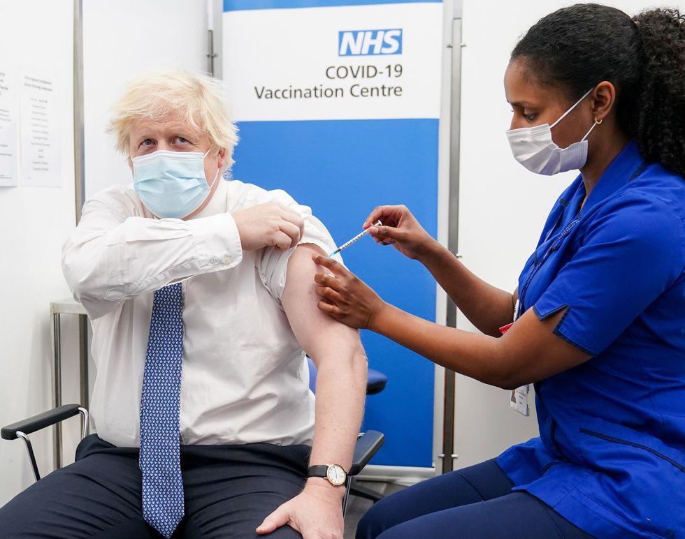 Prime Minister Boris Johnson receiving his booster jab. Faith leaders are supporting the Government in its bid to increase the uptake of booster jabs as Omicron cases surge.