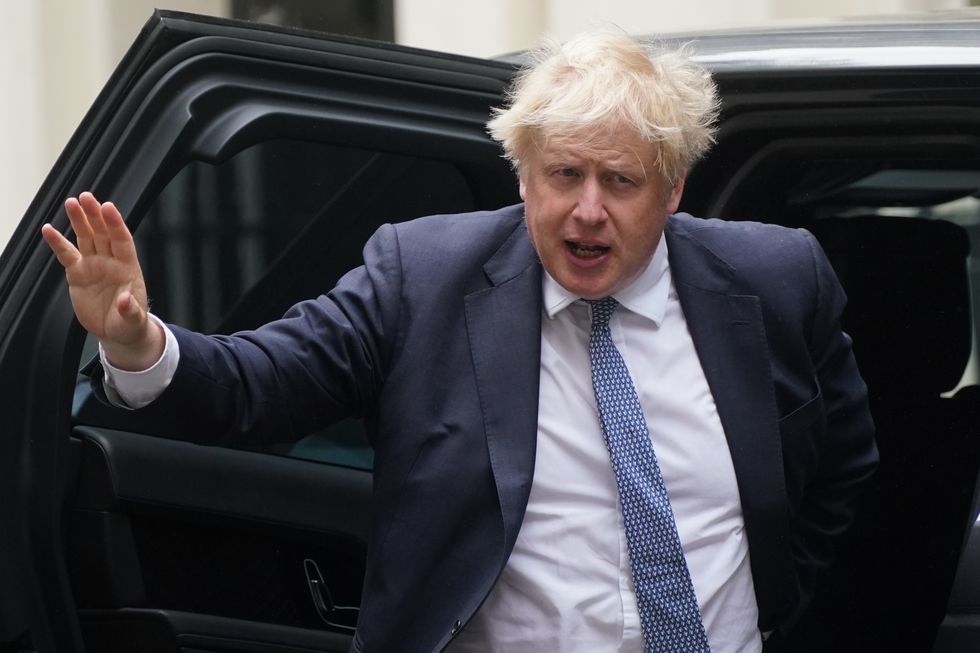 Prime Minister Boris Johnson returns to 10 Downing Street, London, after delivering his statement to the House of Commons following the publication of the Sue Gray report into parties in Whitehall during the coronavirus lockdown. Picture date: Wednesday May 25, 2022.