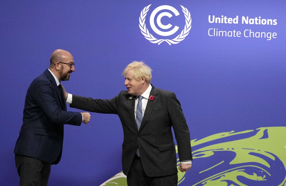 Prime Minister Boris Johnson (right) greets European Council President Charles Michel at the Cop26 summit at the Scottish Event Campus (SEC) in Glasgow. Picture date: Monday November 1, 2021.